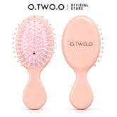 O.TWO.O Hair Brush peach-pink mini detangling brush front and back view in Pakistan