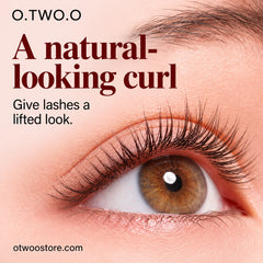 Close-up hazel eye showing naturally lifted and softly curled lashes