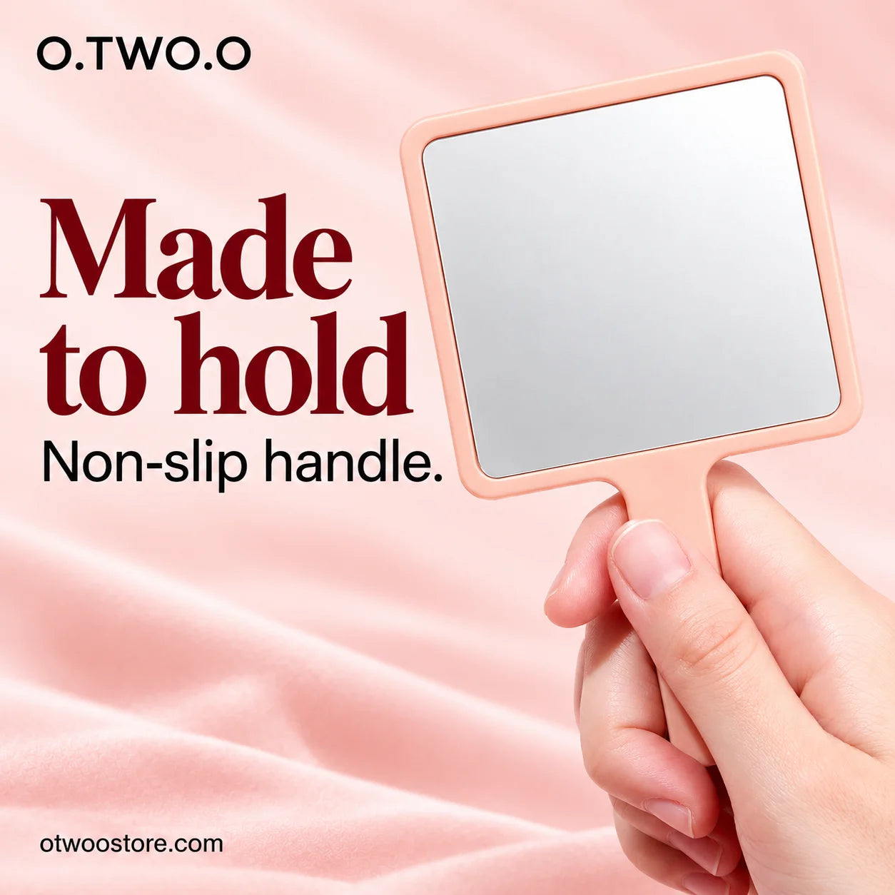 Peach makeup mirror held securely by its comfortable non-slip handle