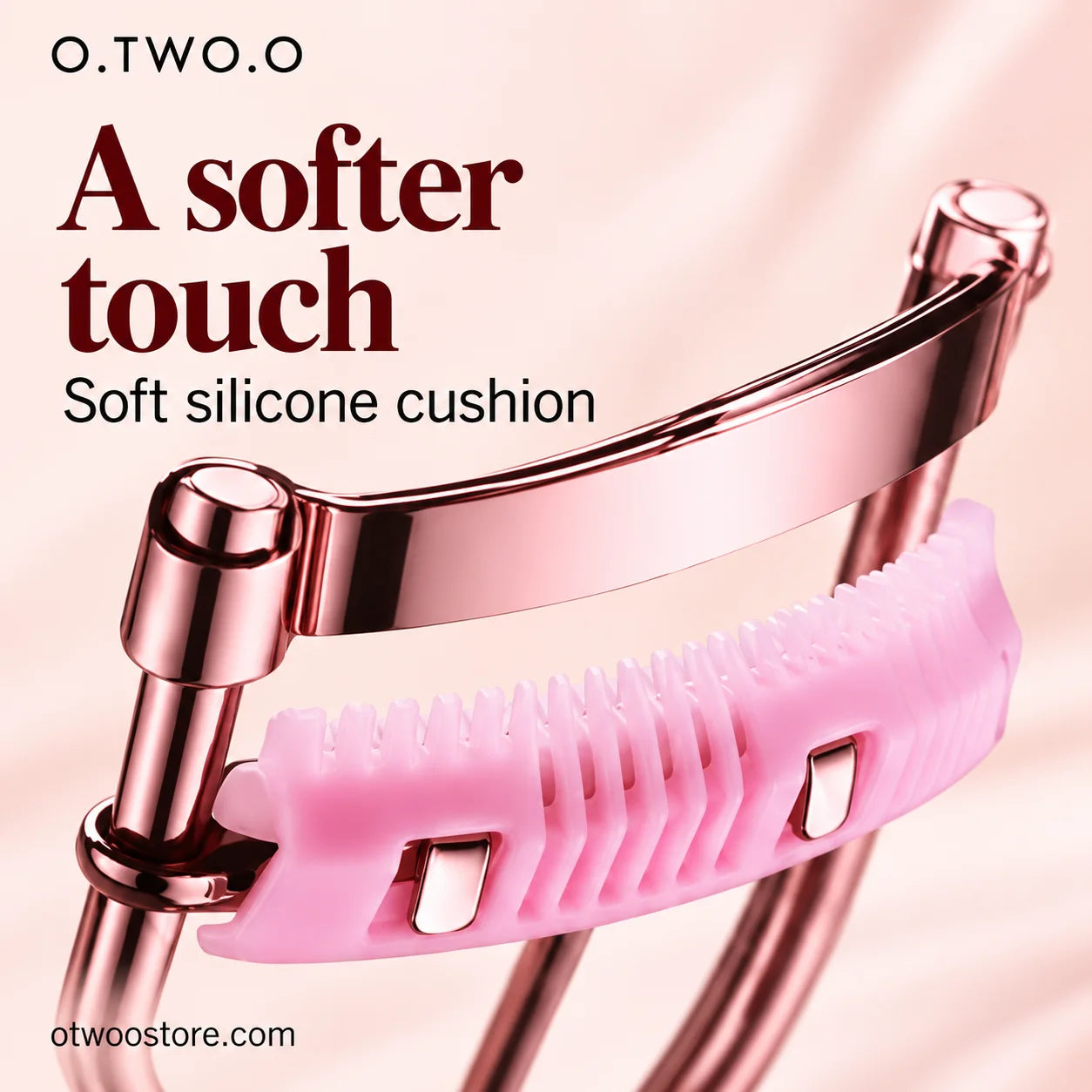 Close-up of soft pink silicone cushion on a rose-gold eyelash curler